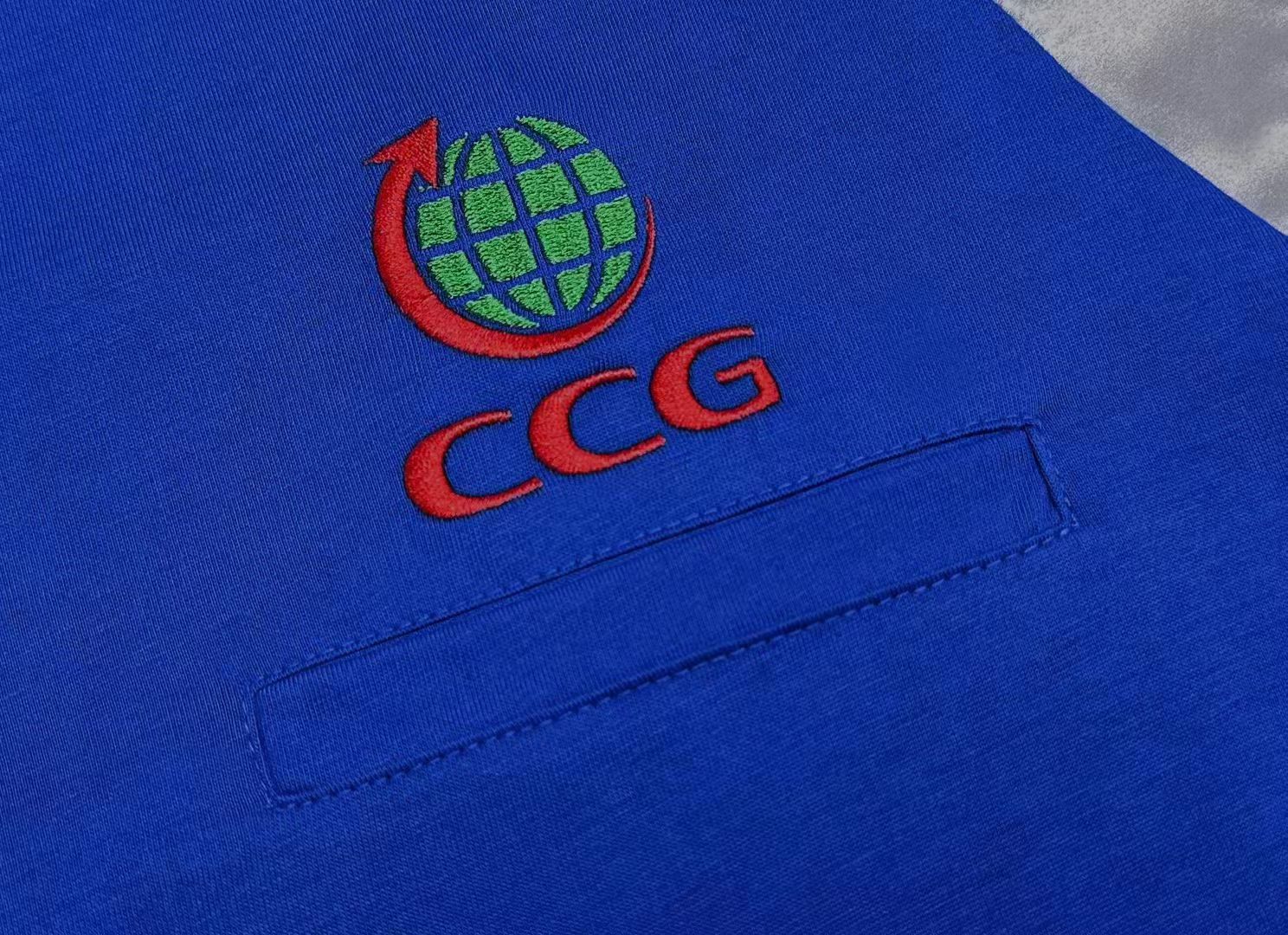 Close-up of an embroidered company logo on custom UPF workwear