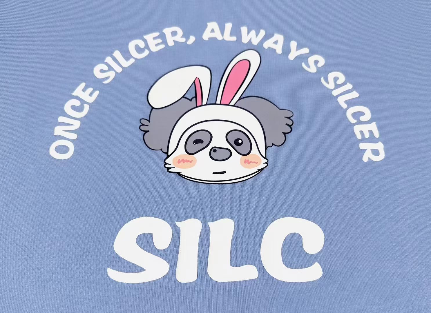 Screen-printed logo detail on custom sun-protection workwear