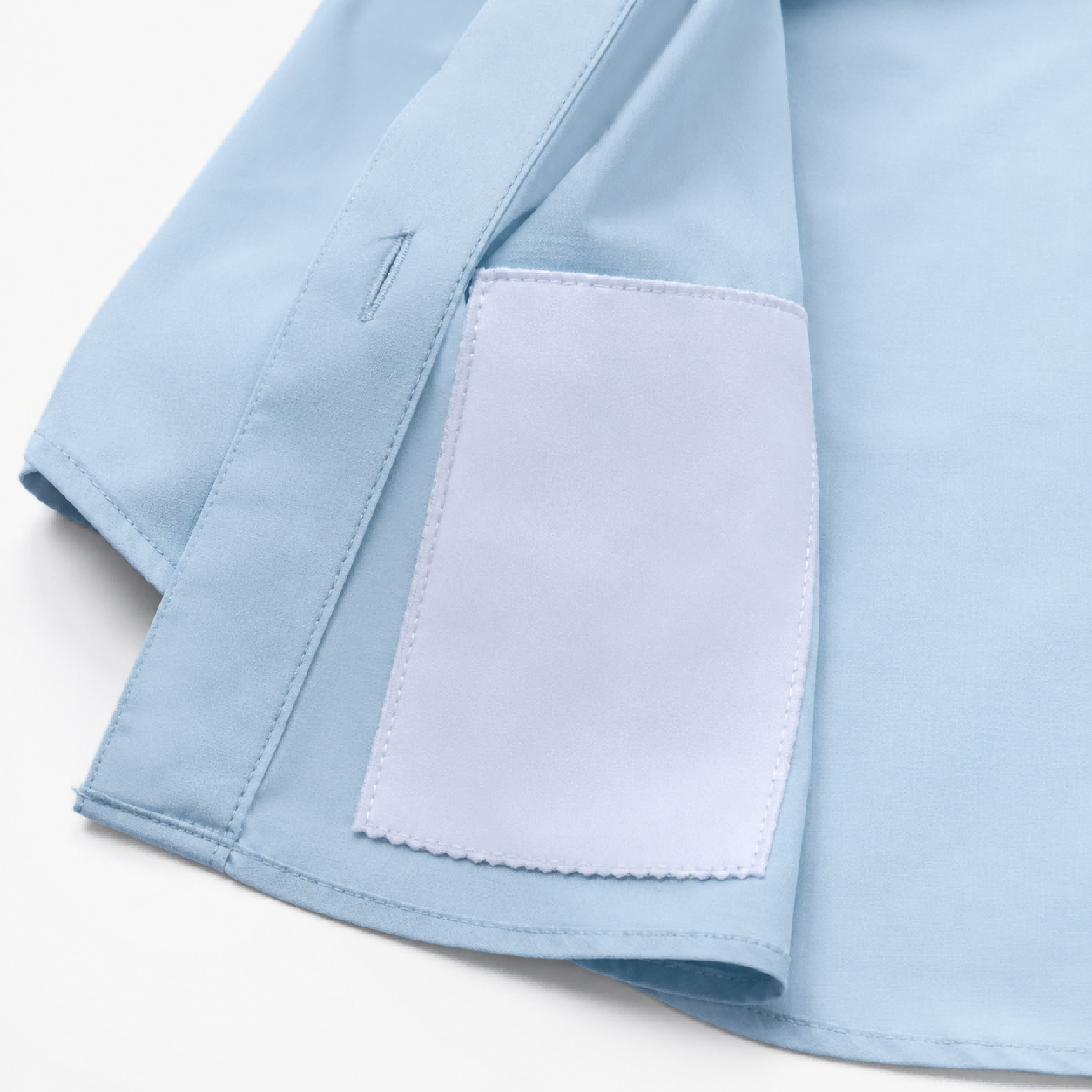 Attached lens cleaner cloth detail on fishing shirt